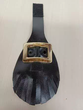 Black Leather Gillie Shawl with Gold Tone Buckle.